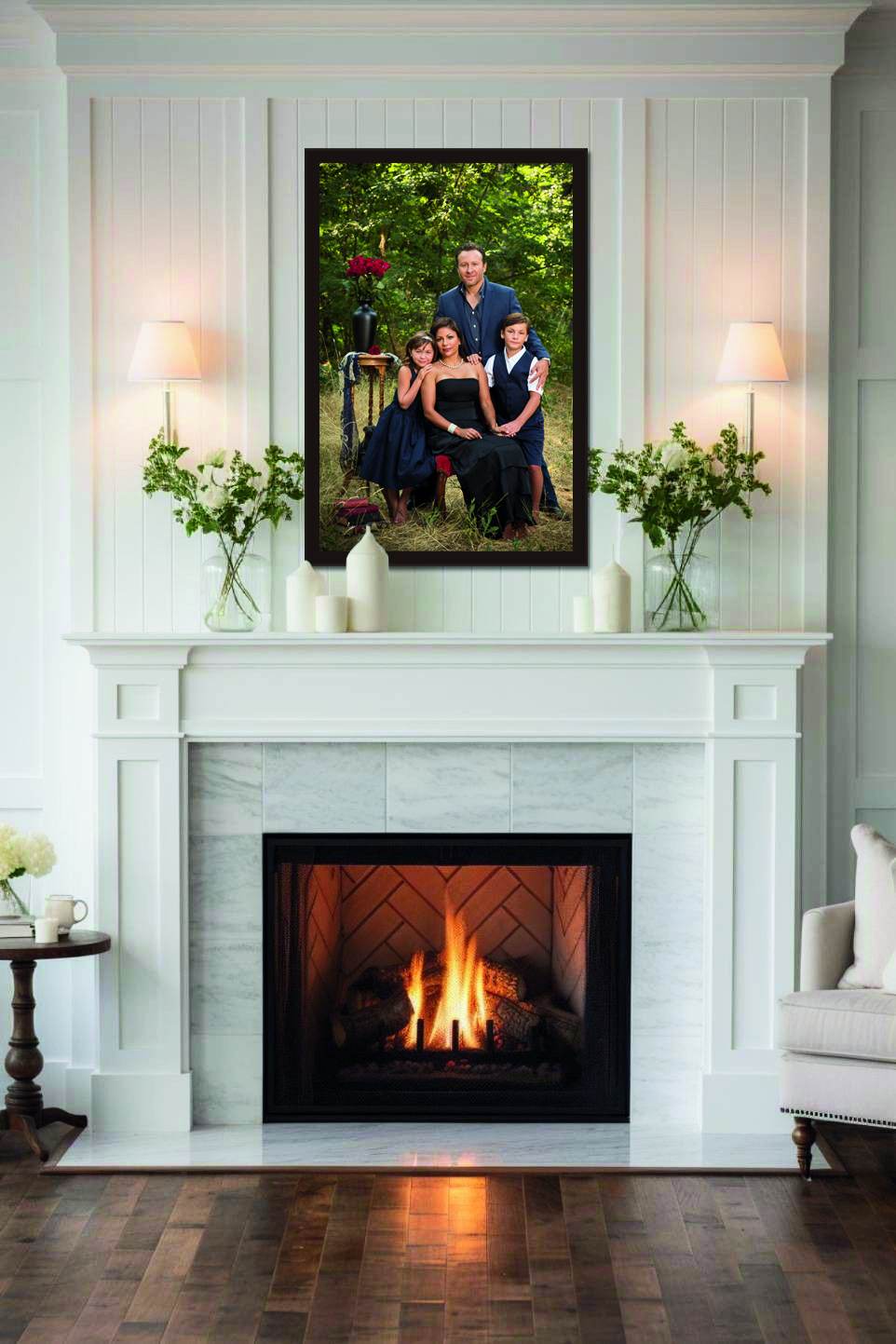 A framed portrait displayed above a white fireplace mantel