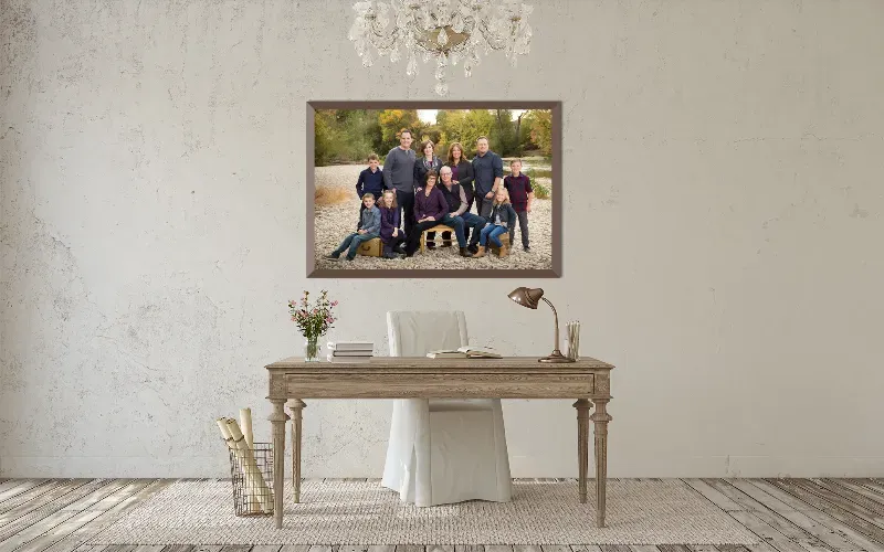 A family portrait above a sectional sofa